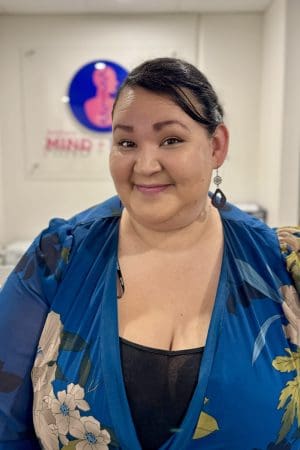 Friendly woman in professional setting.