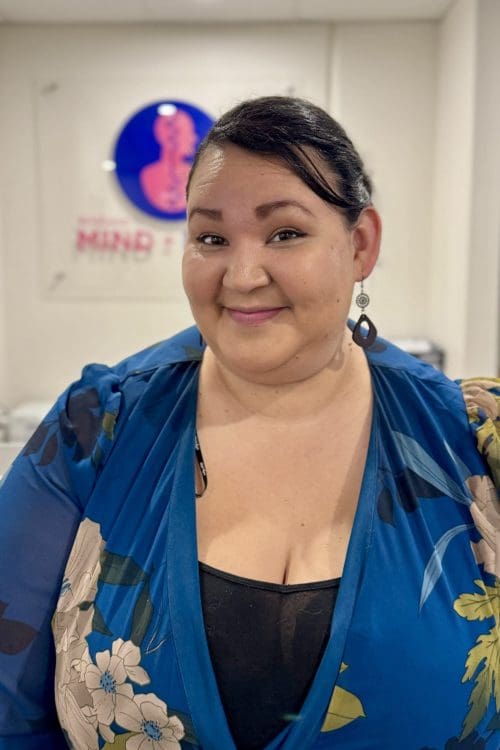 Friendly woman in professional setting.